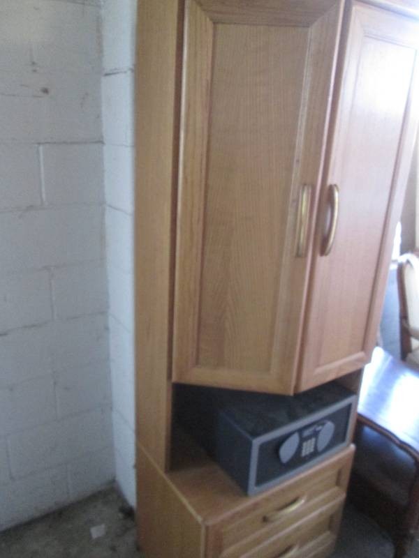 Corner cabinet with built in programmable combination safe
