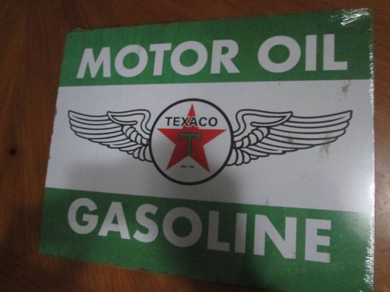 Texaco oil metal sign measures 12 x 14 inches