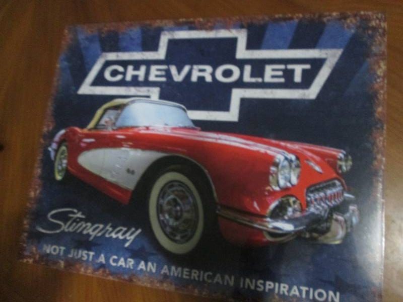 Chevrolet metal sign measures 12 x 14 inches