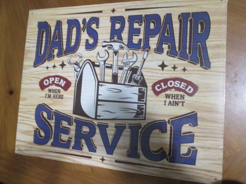 Dads repair service metal sign measures 12 x 14 inches