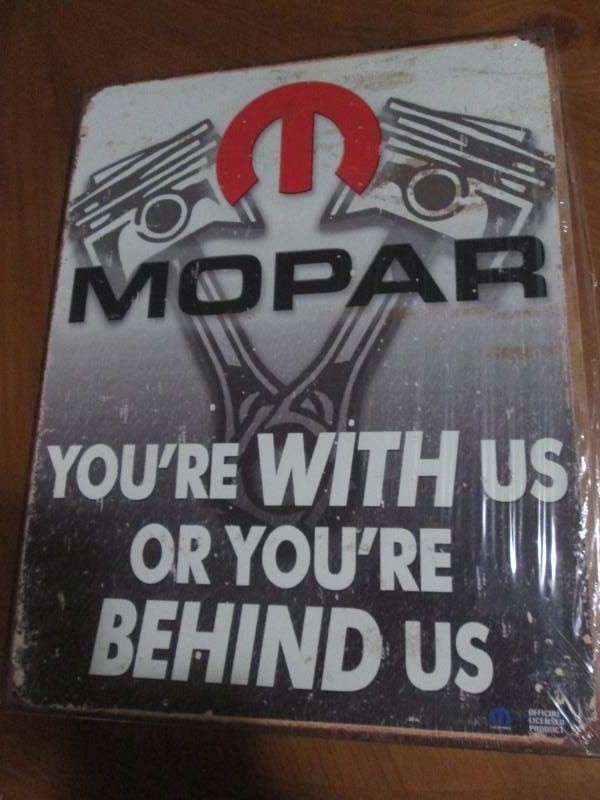 Mopar with authenticity sticker metal sign measures 12 x 14 inches