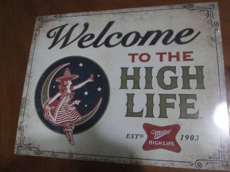 Miller High Life metal sign measures 12 x 14 inches