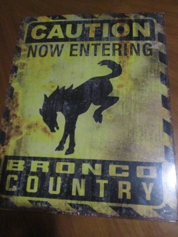 Bronco metal sign with authenticity sticker measures 12 x 14 inches