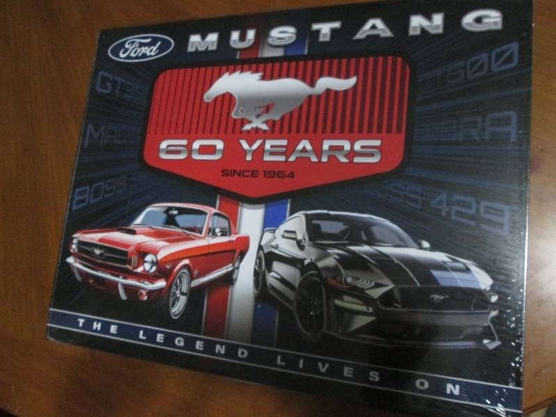 Mustang metal sign with authenticity sticker measures 12 x 14 inches