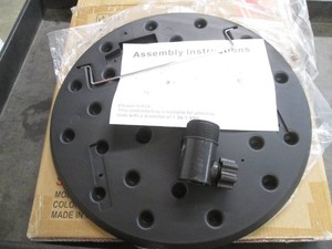 Black plastic table attachment for an umbrella pole