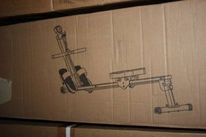 Home gym rowing machine
