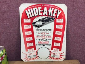 Vintage HIDE-A-KEY Advertiser Metal Sign 11 14 x 14 14