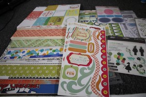 Assorted miscellaneous scrapbooking cardstock and stickers