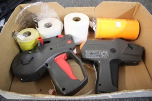 2 price guns with labels