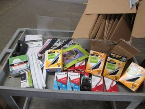 Pens, rulers suction hooks, clipboards and other office supplies