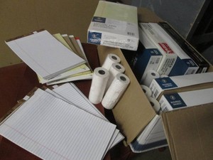 Lot of files, note pads and paper rolls