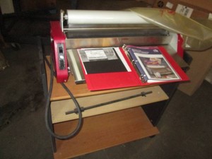 USI Commercial laminator machine with 25 roll of film