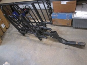 Folding rear vehicle bike carrier