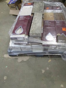 Pallet of tile and laminate flooring