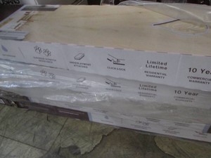 5 Cases of Kings Cottage Oak laminate flooring, each case covers 15.95 sf