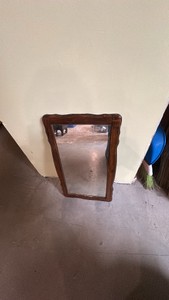 Old mirror with wooden frame