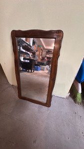 Old mirror with wooden frame