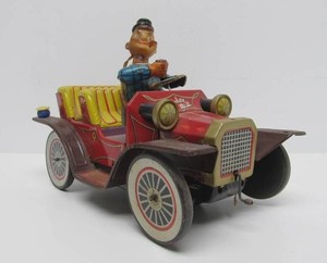 Vintage 1950s era SMOKEY BILL Tin Toy Car