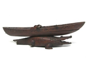 Old Vintage Folk Art Wooden Canoe Riding on Alligator
