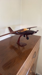 Vintage Wooden Model Airplane on Display Stand
