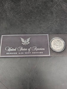 1879 United States Morgan Dollar in Holder