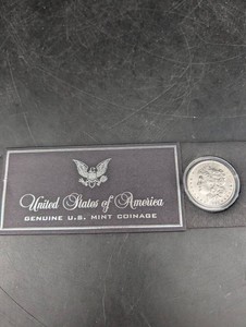 1897 Morgan Dollar With Protective Holder
