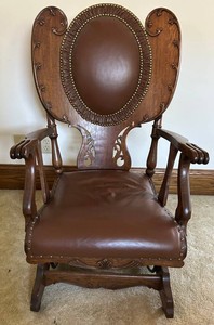 Rare Ornate Carved Wooden Leather Upholstered Rocking Chair