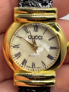 Gold-Tone Quartz Watch With Roman Numeral Dial in the Style of Gucci