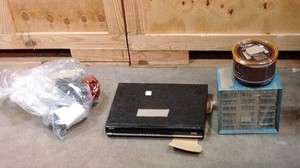 Bag of electronics, DVD player bolt storage, mini crockpot