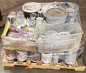 pallet of paint and painting supplies