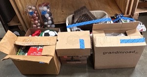 assorted boxes with Christmas items