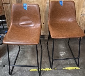 2 brown chairs