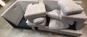 Two of theee pieces gray sectional couch with legs and cushions