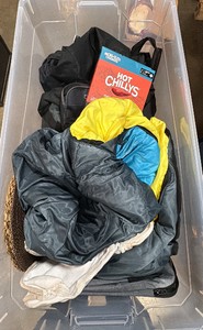 Clear and blue tote with jackets and bags