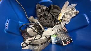 Blah bag and blue tote of tools