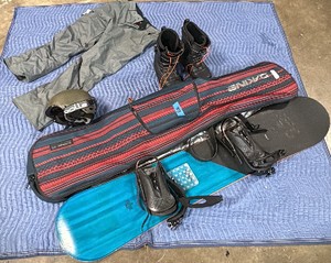 Dakine padded snowboard travel bag, Xl snow pants,THIRTYTWO boots, blue snowboard, Boll snow helmet
