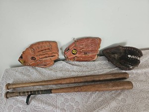 Mid Twentieth Century Baseball Bats & Accompanying Gloves