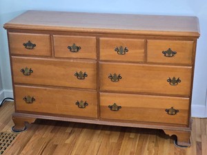 Traditional Eight Drawer Dresser with Decorative Brass Tone Pulls