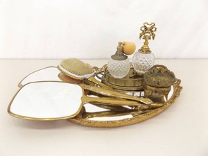 Antique Mirrored Vanity with Perfume Bottles, BrushMirror set, and Jewelry Holder