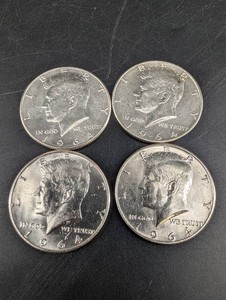 Four 1964 Kennedy Half Dollars