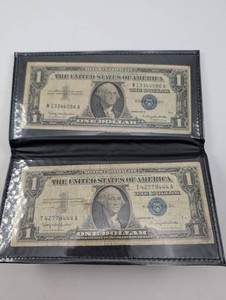 Two $1 United States Silver Certificates, Series 1957 B