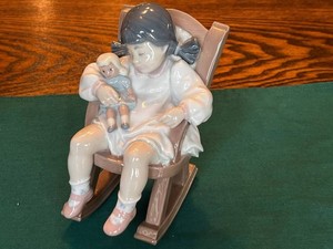 Porcelain Figurine - Lladro Girl Holding Doll in Rocking Chair
