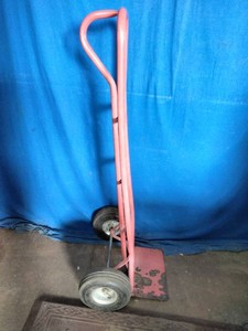 A steel D-handle hand truckdolly,