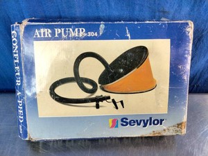 A vintage Sevylor 304 Large Bellow Foot Air Pump packaged in its original box