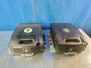 Two Motorola Digital Patroller DP-2 Mobile Video Data Storage Modules.