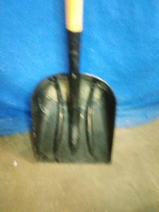 A polypropylene (plastic) scoop shovel
