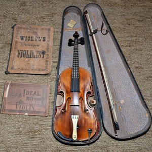 Antique Violin with Sheet Music