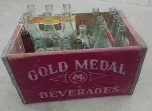 WOODEN GOLD METAL VINTAGEANTIQUE CLEARCOLORED BOTTLES