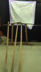 ANTIQUE LARGE QUILTING FRAME AND VINTAGE HANDMADE QUILT