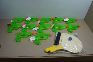 12 Squirt Guns amd Paddle Ball